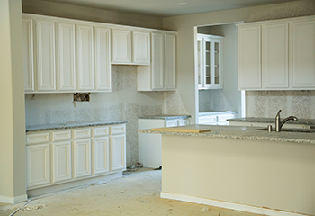 Newly renovated kitchen with white cabinetry and a spacious island in Rancho Palos Verdes.